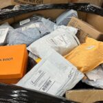 Unclaimed mail pallets in Louisiana with mixed wholesale merchandise boxes